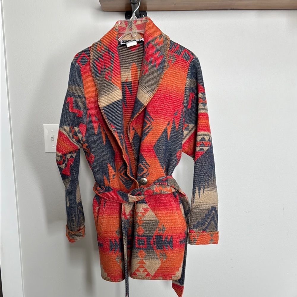 Vibrant Red and Orange Cape with Abstract Pattern